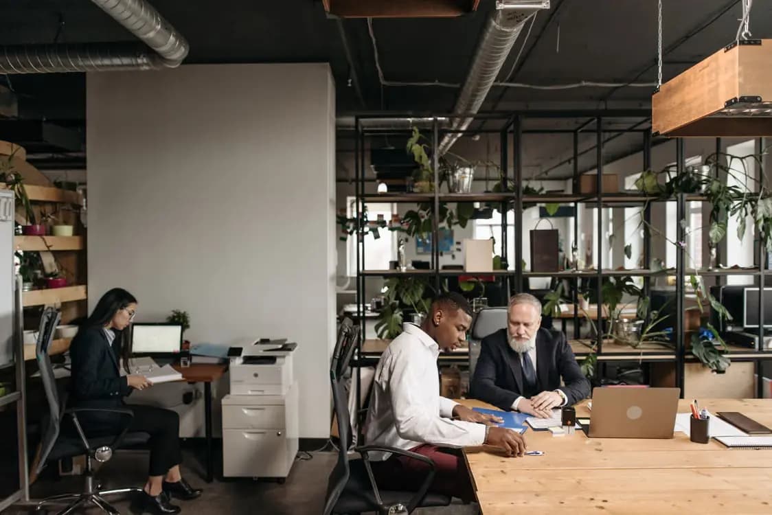Professionals collaborating around a table